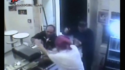 Pizza man hurls plates at armed robbers to defend shop