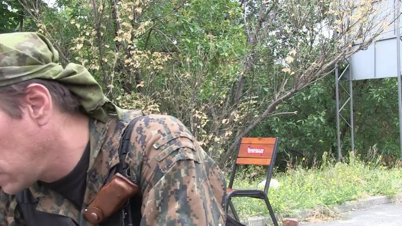 Rebels in Donetsk say shells continue to fall despite truce