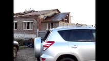 Russian Tornado filmed with Dashcam : house destroyed in front of owner