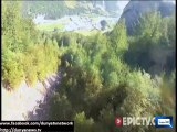 Dunya News - Wingsuit pilot flies through the Swiss Alps at 100 mph