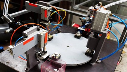 Automatic Punching Machine using Linear Actuators, Indexing Table and Bowel Feeder by students of  Air University Islamabad