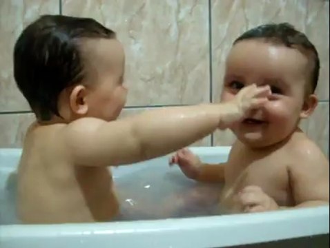 Twins Brothers Enjoying Bath Time