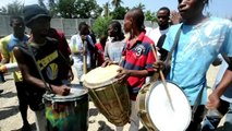 Pro-Aristide Haitians mark St. Jean Bosco massacre