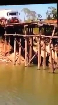 Truck driving on a little Wooden bridge : bad idea and FAIL!