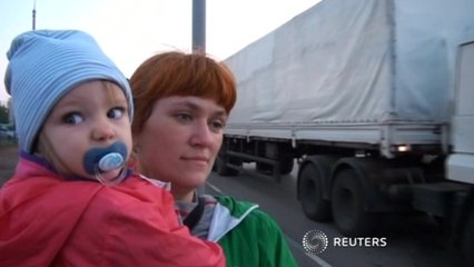 Ukraine PM slams Putin, ceasefire again under strain in east Ukraine