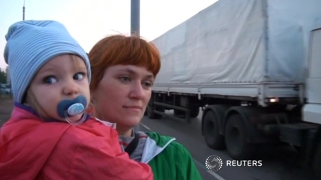 Ukraine PM slams Putin, ceasefire again under strain in east Ukraine