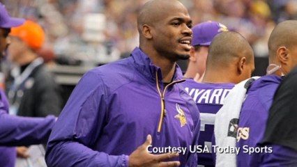 NFL star Peterson charged with injuring child