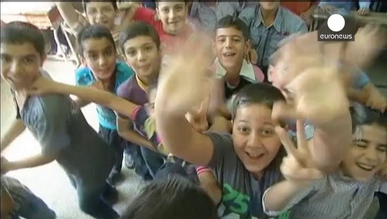 Schools reopen in war torn Gaza and Damascus