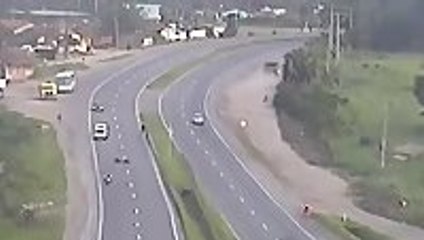 Guy slides under truck that cut him off