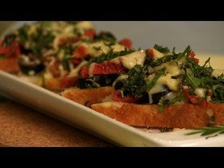 Olive & Sun Dried Tomato Crostini By Asha Khatau