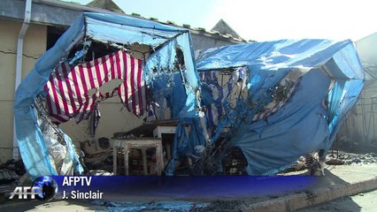 Ukraine: un marché réduit en cendres dans un bombardement