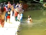 Man trying to save a boy felt in the water but who doesn't need help anymore... Awkward moment!