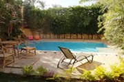Furnished / Semi Furnished Villa for Rent in El Guzeira Compound New Cairo with Private Garden   Swimming Pool.