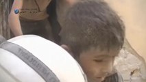 Video captures boy's rescue from rubble in Syria bombing aftermath