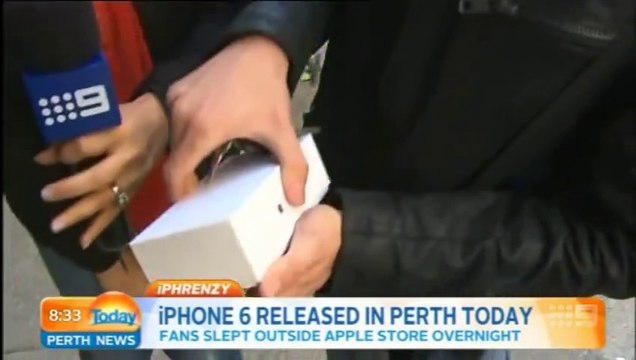 Crazy iPhone 6 FAIL : First person to buy an iPhone 6 immediately drops it during TV interview