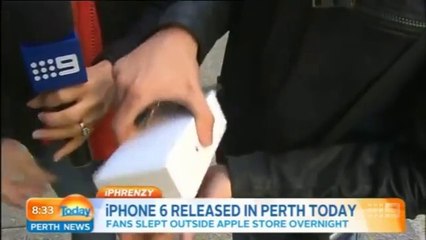 First man to buy iPhone 6 in Australia promptly drops it on live television. Epic fail