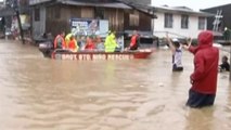 Philippines floods: Thousands flee Manila, one dead