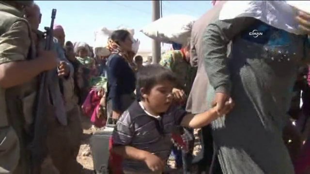 Turkey reopens border to Syrian Kurds fleeing IS group