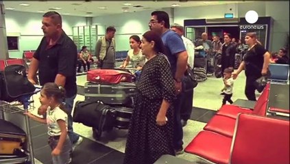 Іракські біженці-християни прилетіли до Франції урядовим літаком