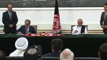 Afghan presidential rivals sign power-sharing deal