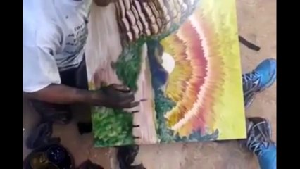 Un homme nous montre comment peindre avec ses doigts