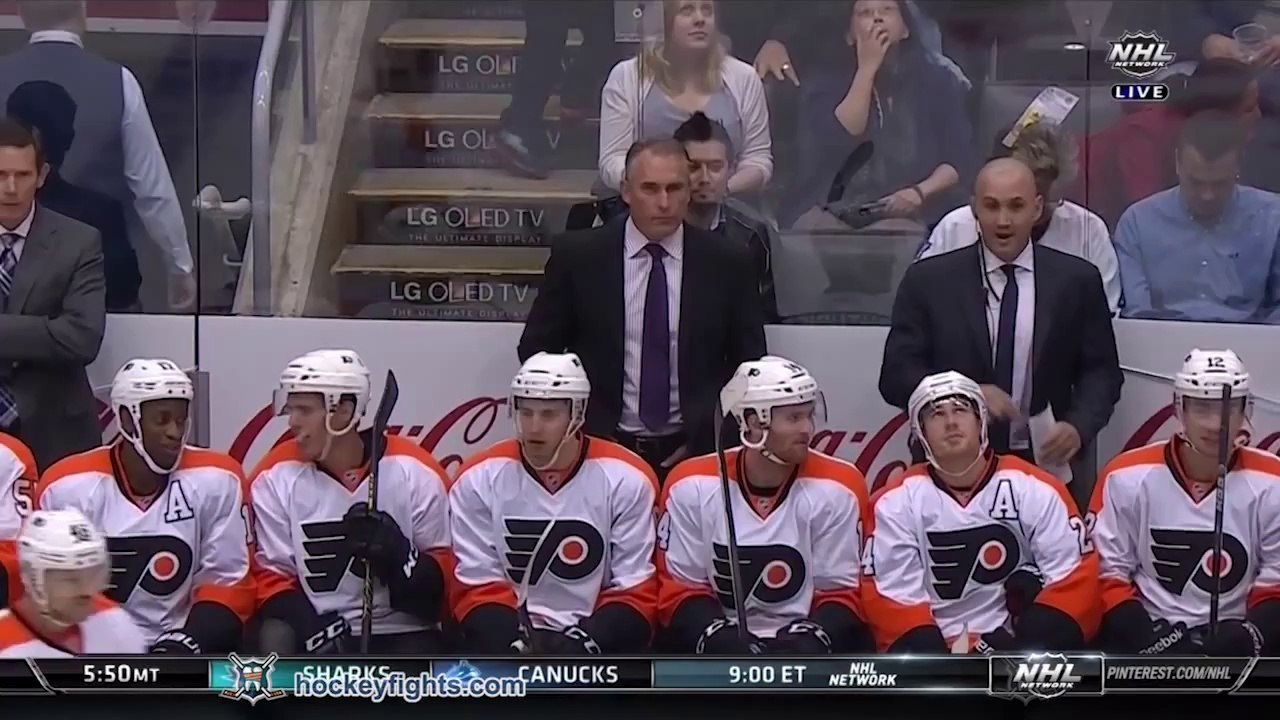 Hockey fight : Zack Stortini vs David Broll from the Philadelphia Flyers at Toronto Maple Leafs game on Sep 23, 2014.