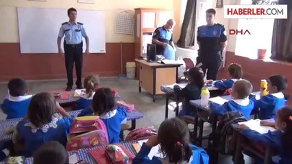 Polisten İlkokul Öğrencilerine Hediyeli Eğitim