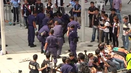 Protesters removed from government building