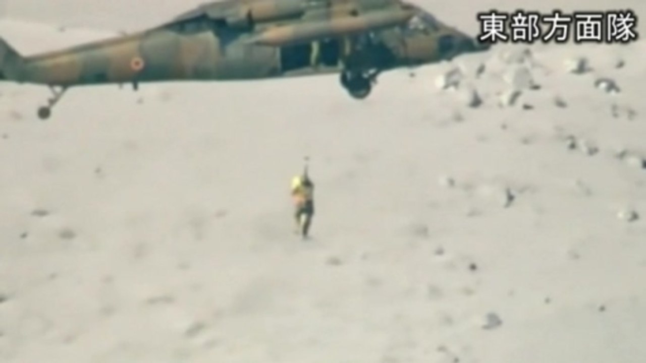 Military helicopters rescue people stranded after Mt Ontake eruption