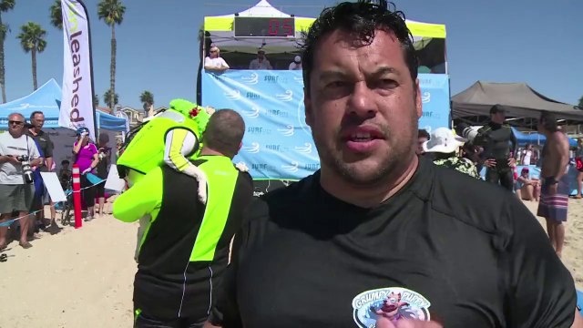 Annual dog surfing competition draws California crowds