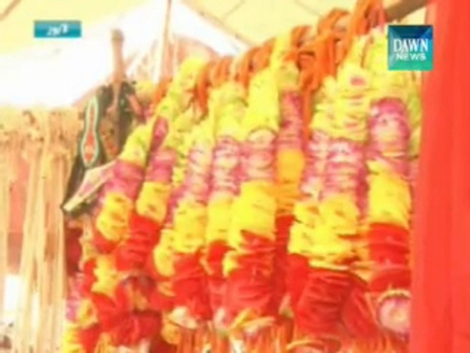 Garlands for sacrificial animals attracting buyers
