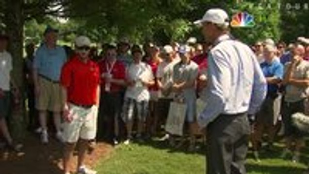 Rory Mc Ilroys ball lands in spectators pocket