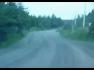 Ghost Filmed walking across a Road