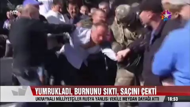 Ukraynalı Milliyetçiler Rusya Yanlısı vekile meydan dayağı attı