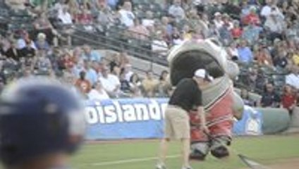 Fish mascot gobbles up a ball boy