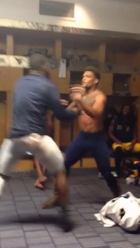 West Virginia Football Team Has Fake Wrestling Brawl in Locker Room