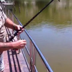 A British is fishing in a lake beside Sea. I'm questioning :)