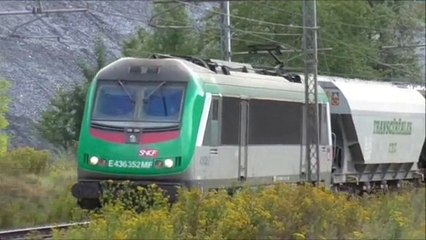 BB36000 : Convoi de wagons Transcéréales à l'approche de la gare de Modane en Maurienne