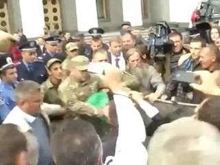 ‘Corrupt’ Ukraine MPs thrown into bins 1