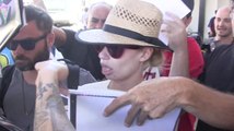 Iggy Azalea Is Mobbed By Fans At LAX