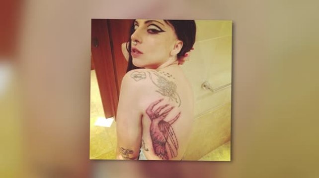 Lady Gaga Gets 'Paws Up' Claw Tattoo, Exposes Backside