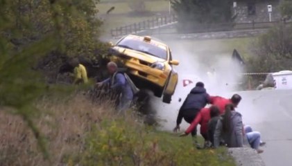 Spectators Somehow Avoid Getting Hit By A Race Car!