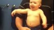 Baby Adorably Flexes Muscles With Dad
