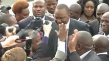 Kenyatta arrives at global court, accused of crimes against humanity
