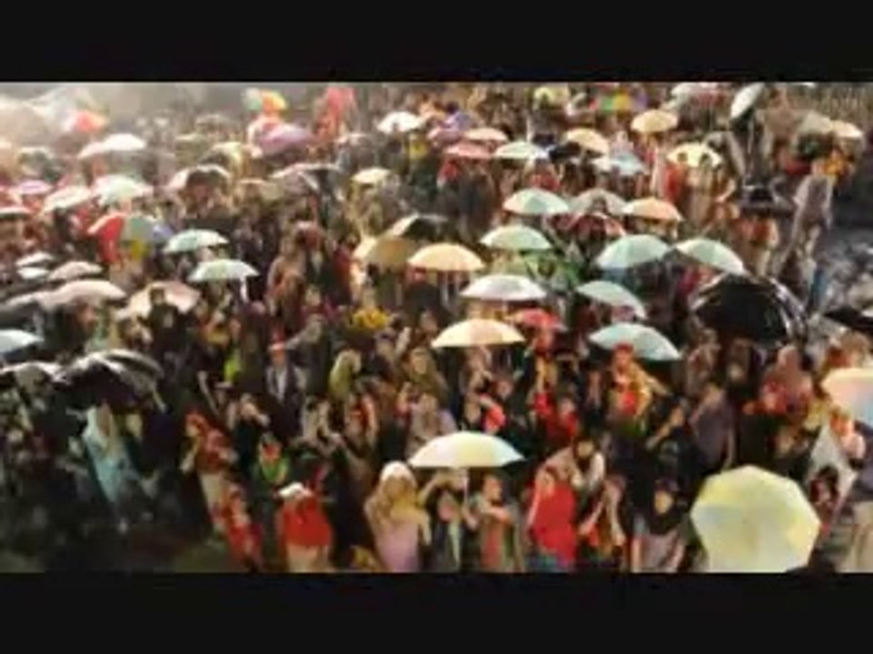 7th October Imran Khan on TV interview in the rain and among his beautiful and loving company of his supporters likewise enjoying the rain