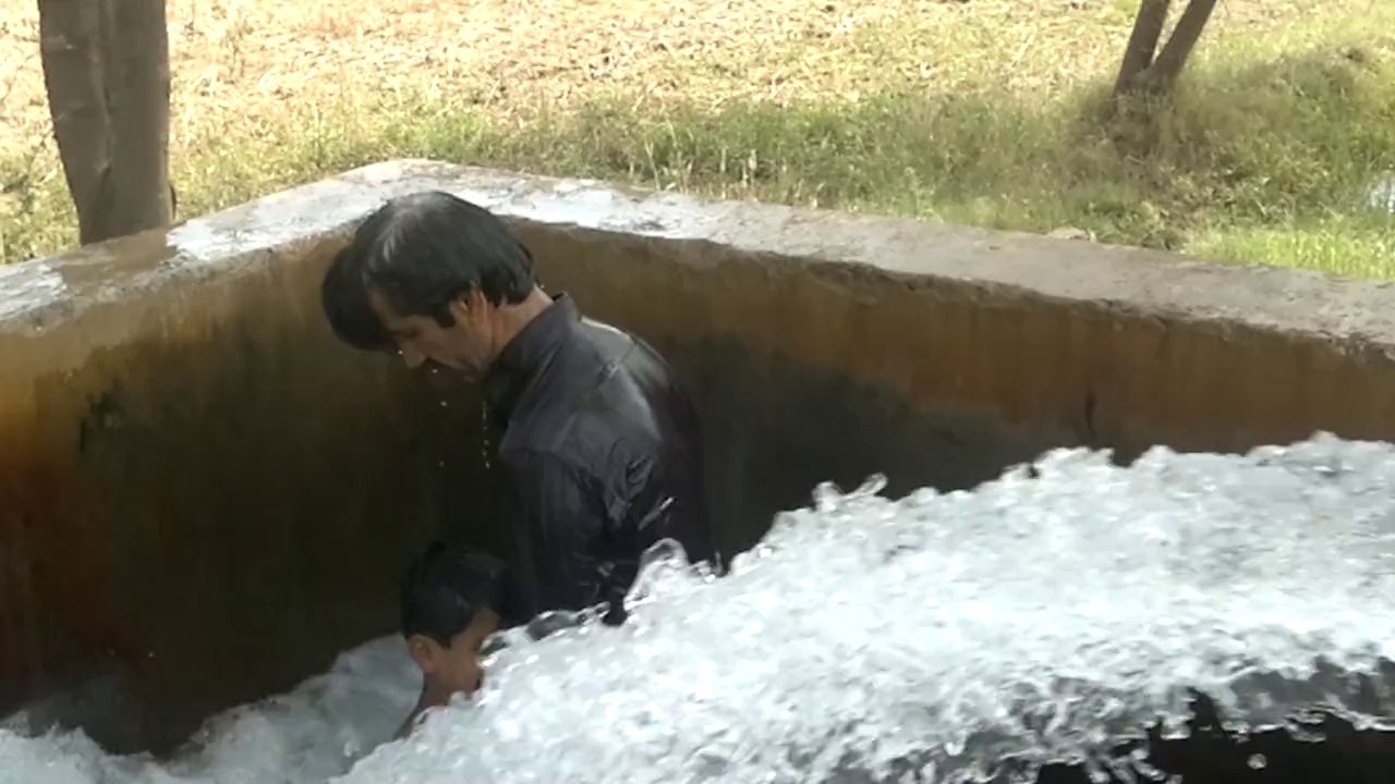 bathing at tubewel