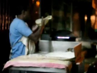 Cooking rumali roti (handkerchief bread)