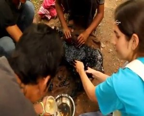 Hintli Gençlerin Sıcak Katrana Bulanmış Köpeği Kurtarması