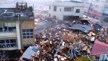 New Video of Japan Tsunami - Ground Level Footage Showing Surge