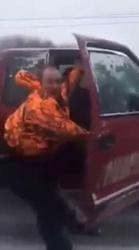 Crazy guy skating on highway covered with snow, pulled by a car